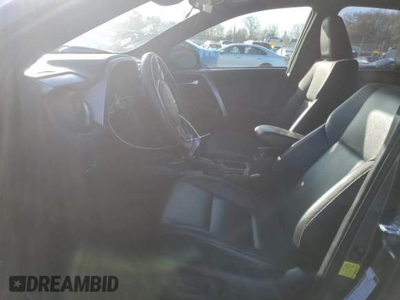 2018 Toyota RAV4 Hybrid SE with VIN JTMJJREV5JD210274, listed as a Copart auction lot 52450645 with 108,249 mi miles and Salvage title. Bid and sale history available at DreamBid. Image 7.