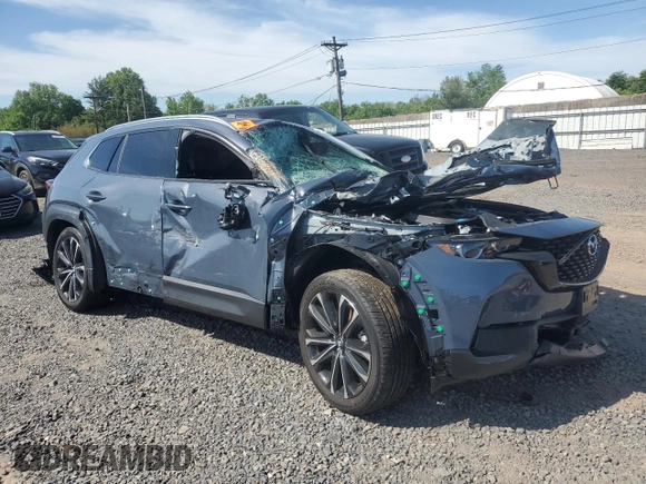 2025 Mazda CX-50 S Premium Plus with VIN 7MMVABEM1SN319228, listed as a Copart auction lot 55958135 with 4,133 mi miles and Salvage title. Bid and sale history available at DreamBid. Image 4.