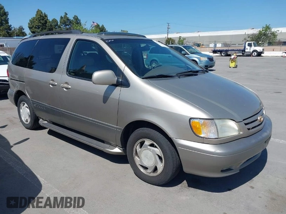 2001 Toyota Sienna LE with VIN 4T3ZF13C21U397063, listed as a IAAI auction lot 42033574 with 219,783 mi miles. Bid and sale history available at carsss.com. Image 1.