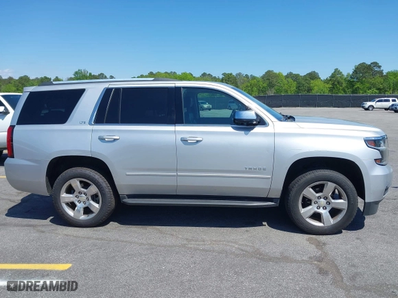 2015 Chevrolet Tahoe LTZ with VIN 1GNSCCKC3FR202934, listed as a IAAI auction lot 41995474 with 258,186 mi miles. Bid and sale history available at carsss.com. Image 13.