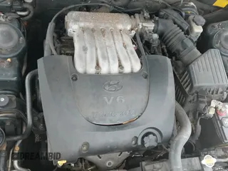 2001 Hyundai Sonata GLS z VIN KMHWF35V91A488497, wystawiony jako IAAI lot #43411854 z przebiegiem 171 989 mil mil oraz . Historia ofert i sprzedaży dostępna na DreamBid. Obrazek 12.