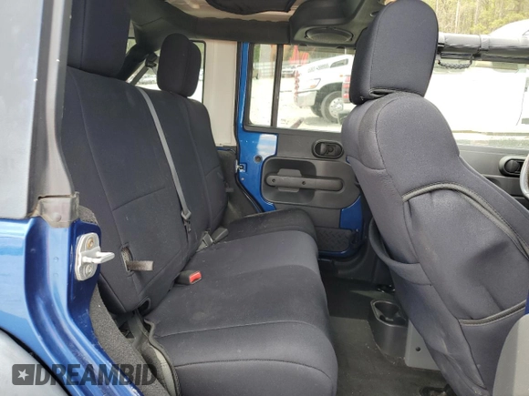 2009 Jeep Wrangler Unlimited Rubicon with VIN 1J4GA69169L762992, listed as a Copart auction lot 51674355 with 147,181 mi miles and Salvage title. Bid and sale history available at DreamBid. Image 11.