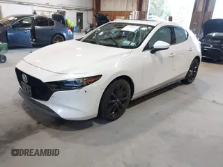 2021 Mazda 3 Premium with VIN JM1BPBML6M1348258, listed as a IAAI auction lot 42752477 with 35,285 mi miles and . Bid and sale history available at DreamBid. Image 17.