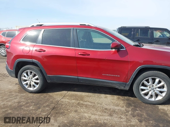 2015 Jeep Cherokee Limited with VIN 1C4PJMDSXFW577462, listed as a IAAI auction lot 41788083 with 155,120 mi miles and . Bid and sale history available at DreamBid. Image 14.