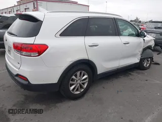 2017 Kia Sorento LX with VIN 5XYPG4A50HG232597, listed as a IAAI auction lot 42196386 with 107,514 mi miles and . Bid and sale history available at DreamBid. Image 4.