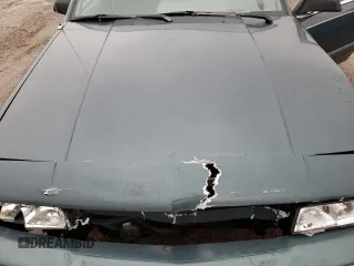 1996 Oldsmobile Cutlass Ciera 1SA VX5 z VIN 1G3AJ55M2T6382818, wystawiony jako Copart lot #80290114 z przebiegiem 137 463 mil mil oraz Szkody całkowita. Historia ofert i sprzedaży dostępna na DreamBid. Obrazek 11.