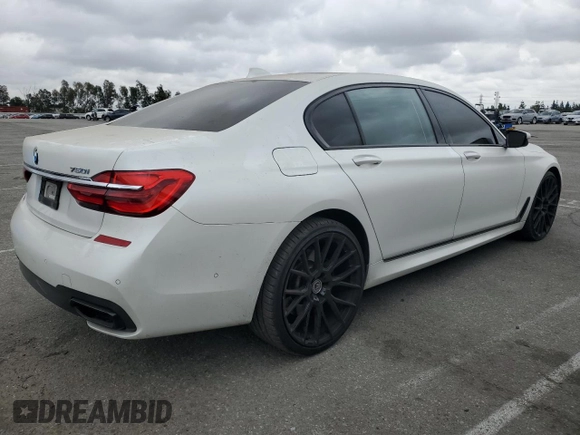 2018 BMW 7 Series 750i with VIN WBA7F0C53JGM24069, listed as a Copart auction lot 53515035 with 79,803 mi miles and Salvage Title. Bid and sale history available at carsss.com. Image 3.