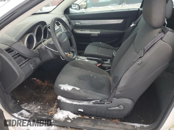 2010 Chrysler Sebring Touring with VIN 1C3BC5EDXAN219324, listed as a Copart auction lot 86085084 with 147,209 mi miles and Salvage Title. Bid and sale history available at carsss.com. Image 7.