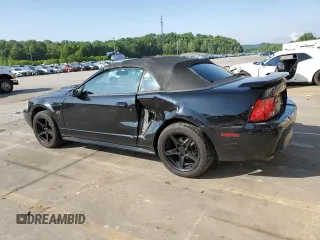 2002 Ford Mustang GT Deluxe with VIN 1FAFP45X02F201213, listed as a Copart auction lot 56493595 with 81,776 mi miles and Salvage title. Bid and sale history available at DreamBid. Image 2.