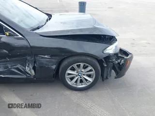 2014 BMW 5 Series 528i with VIN WBA5A5C52ED503033, listed as a IAAI auction lot 41562997 with 127,564 mi miles. Bid and sale history available at carsss.com. Image 14.