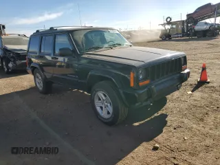 2001 Jeep Cherokee Sport with VIN 1J4FF58S71L540211, listed as a Copart auction lot 87089444 with 190,711 mi miles and Clean title. Bid and sale history available at DreamBid. Image 4.