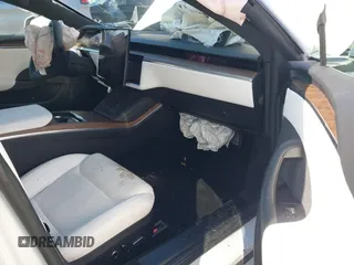 2022 Tesla Model S with VIN 5YJSA1E51NF491493, listed as a IAAI auction lot 41570494 with Not Provided miles and . Bid and sale history available at DreamBid. Image 5.