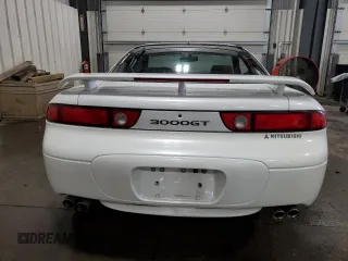 1996 Mitsubishi 3000GT GT z VIN JA3AM84J5TY002387, wystawiony jako Copart lot #64983534 z przebiegiem 149 380 mil mil oraz Szkody całkowita. Historia ofert i sprzedaży dostępna na DreamBid. Obrazek 6.