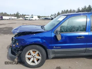 2005 Ford Escape Hybrid with VIN 1FMCU96HX5KC07148, listed as a IAAI auction lot 41741158 with 225,598 mi miles. Bid and sale history available at carsss.com. Image 12.