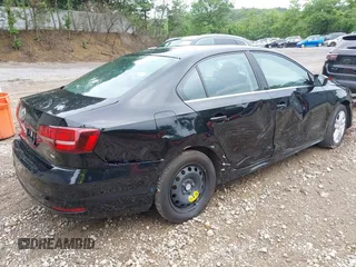 2017 Volkswagen Jetta S z VIN 3VW2B7AJ3HM303198, wystawiony jako IAAI lot #42651056 z przebiegiem 126 253 mil mil oraz . Historia ofert i sprzedaży dostępna na DreamBid. Obrazek 4.