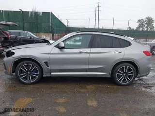 2021 BMW X4 M with VIN 5YMUJ0C01M9F26207, listed as a IAAI auction lot 41502307 with 31,995 mi miles. Bid and sale history available at carsss.com. Image 14.