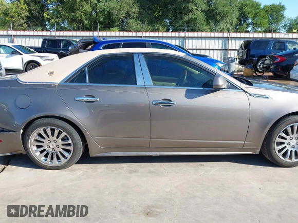 2012 Cadillac CTS Luxury z VIN 1G6DF5E58C0142041, wystawiony jako IAAI lot #42235864 z przebiegiem 59 697 mil mil oraz . Historia ofert i sprzedaży dostępna na DreamBid. Obrazek 13.