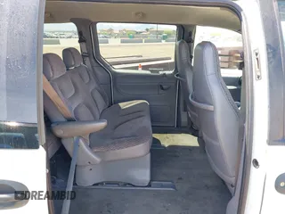 1999 Dodge Caravan with VIN 2B4FP2534XR161940, listed as a IAAI auction lot 41974872 with 162,035 mi miles and . Bid and sale history available at DreamBid. Image 8.