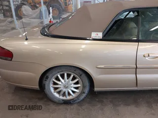 2001 Chrysler Sebring z VIN 1C3EL45U11N673923, wystawiony jako IAAI lot #41554949 z przebiegiem Nie podano mil oraz . Historia ofert i sprzedaży dostępna na DreamBid. Obrazek 11.