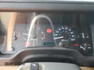 1999 Jeep Wrangler Sahara z VIN 1J4FY49S0XP453920, wystawiony jako Copart lot #61808475 z przebiegiem 129 062 mil mil oraz Czysty tytuł • Clean title. Historia ofert i sprzedaży dostępna na DreamBid. Obrazek 9.