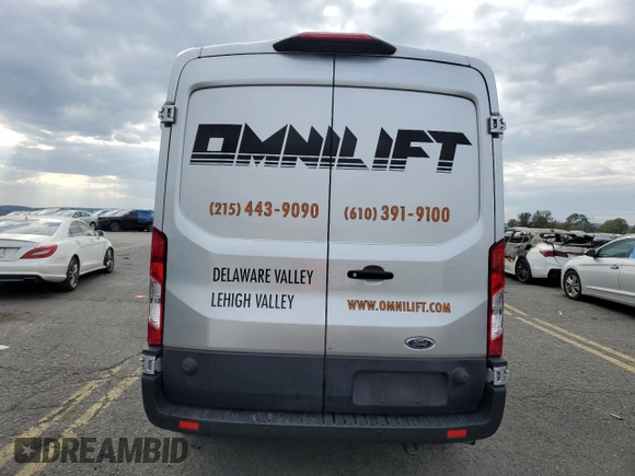 2023 Ford Transit Cargo with VIN 1FTBW9C89PKA44249, listed as a Copart auction lot 75167994 with 21,652 mi miles and Salvage Title. Bid and sale history available at DreamBid. Image 6.