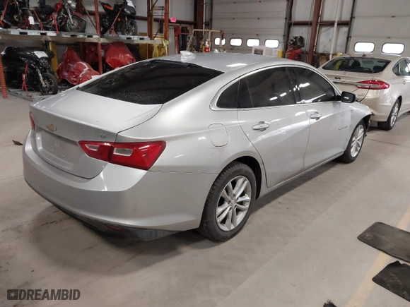 2018 Chevrolet Malibu LT with VIN 1G1ZD5ST6JF241438, listed as a IAAI auction lot 41684121 with 140,227 mi miles. Bid and sale history available at carsss.com. Image 4.