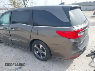 2018 Honda Odyssey Touring with VIN 5FNRL6H83JB008463, listed as a IAAI auction lot 41805044 with 65,001 mi miles. Bid and sale history available at carsss.com. Image 3.