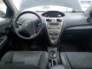 2012 Toyota Yaris with VIN JTDBT4K33CL035567, listed as a Copart auction lot 51837505 with 233,895 mi miles and Salvage Title. Bid and sale history available at DreamBid. Image 8.