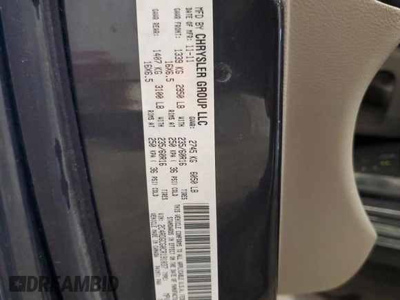 2012 Dodge Grand Caravan SXT with VIN 2C4RDGCG0CR191037, listed as a Copart auction lot 50930675 with 142,093 mi miles and Salvage Title. Bid and sale history available at DreamBid. Image 14.
