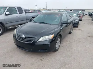 2007 Toyota Camry Hybrid with VIN JTNBB46K873038633, listed as a IAAI auction lot 41927918 with 203,466 mi miles. Bid and sale history available at carsss.com. Image 2.
