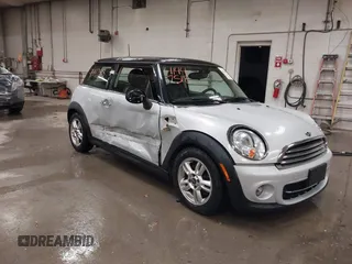 2013 MINI Hardtop with VIN WMWSU3C51DT374317, listed as a IAAI auction lot 41447518 with 142,943 mi miles and . Bid and sale history available at DreamBid. Image 1.