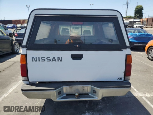 1997 Nissan Frontier XE with VIN 1N6SD16S3VC427137, listed as a Copart auction lot 57911575 with 228,542 mi miles and Clean title. Bid and sale history available at DreamBid. Image 6.