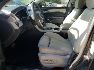2016 Cadillac SRX Performance Collection z VIN 3GYFNCE30GS572828, wystawiony jako Copart lot #55176485 z przebiegiem 108 767 mil mil oraz Szkoda całkowita • Salvage title. Historia ofert i sprzedaży dostępna na DreamBid. Obrazek 7.