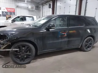 2013 Dodge Durango R/T z VIN 1C4SDJCT4DC670406, wystawiony jako IAAI lot #41685272 z przebiegiem 230 767 mil mil oraz . Historia ofert i sprzedaży dostępna na DreamBid. Obrazek 14.