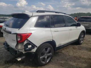 2021 Honda Passport Touring z VIN 5FNYF7H91MB015479, wystawiony jako Copart lot #56127214 z przebiegiem 28 039 mil mil oraz Szkoda całkowita • Salvage title. Historia ofert i sprzedaży dostępna na DreamBid. Obrazek 3.