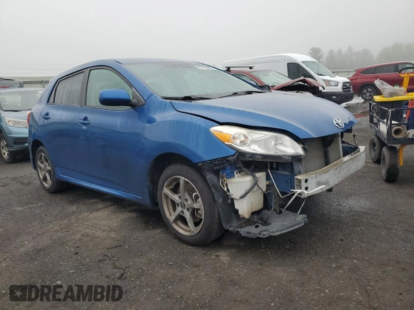 2009 Toyota Matrix S with VIN 2T1LE40E29C011912, listed as a Copart auction lot 57103465 with 128,900 mi miles and Salvage title. Bid and sale history available at DreamBid. Image 4.
