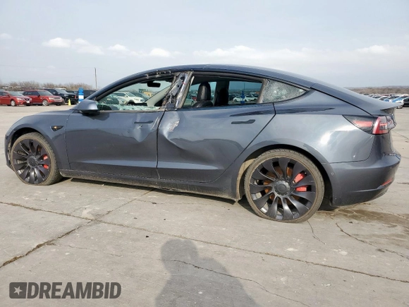 2021 Tesla Model 3 Performance with VIN 5YJ3E1EC5MF850673, listed as a Copart auction lot 47560665 with 96,950 mi miles and Salvage Title. Bid and sale history available at DreamBid. Image 2.