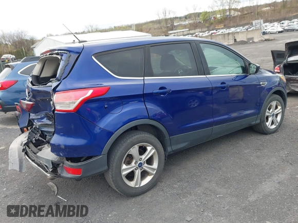 2015 Ford Escape SE with VIN 1FMCU9GX4FUC73125, listed as a IAAI auction lot 42071815 with 71,681 mi miles. Bid and sale history available at carsss.com. Image 4.
