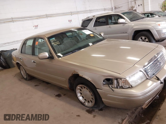 2000 Ford Crown Victoria LX z VIN 2FAFP74W2YX110824, wystawiony jako IAAI lot #42274655 z przebiegiem 93 653 mil mil oraz . Historia ofert i sprzedaży dostępna na DreamBid. Obrazek 6.