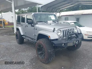2016 Jeep Wrangler Unlimited Sahara with VIN 1C4BJWEG5GL117872, listed as a IAAI auction lot 42692798 with 119,819 mi miles and . Bid and sale history available at DreamBid. Image 1.