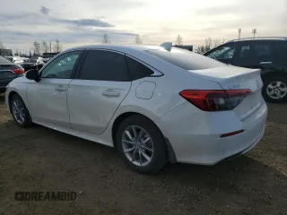 2024 Honda Civic Sedan EX with VIN 2HGFE2F3XRH117877, listed as a Copart auction lot 80212554 with 8,640 mi miles and Clean Title. Bid and sale history available at carsss.com. Image 2.