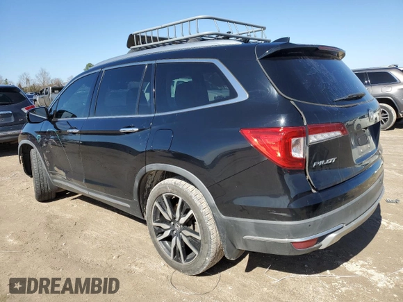 2019 Honda Pilot Touring 7-Passenger z VIN 5FNYF5H69KB019903, wystawiony jako Copart lot #43598805 z przebiegiem 144 486 mil mil oraz Szkoda całkowita • Salvage title. Historia ofert i sprzedaży dostępna na DreamBid. Obrazek 2.