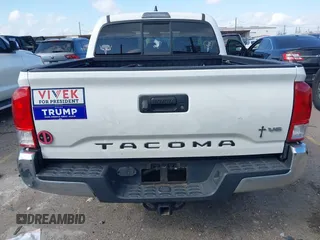 2017 Toyota Tacoma SR5 with VIN 5TFAZ5CN8HX043633, listed as a IAAI auction lot 41520703 with 104,711 mi miles and . Bid and sale history available at DreamBid. Image 16.