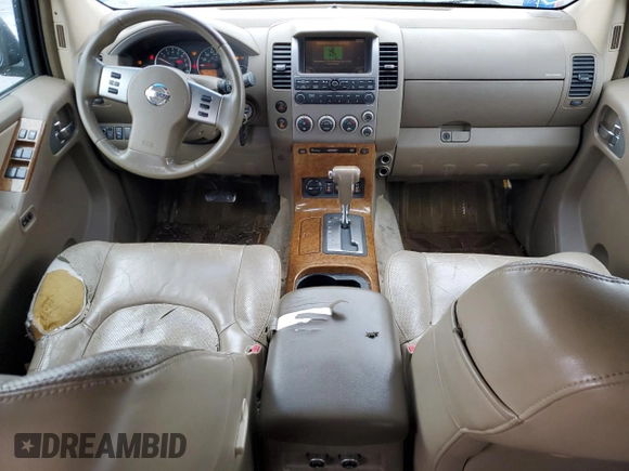 2005 Nissan Pathfinder SE z VIN 5N1AR18W65C705332, wystawiony jako Copart lot #86779704 z przebiegiem 119 877 mil mil oraz Czysty tytuł • Clean title. Historia ofert i sprzedaży dostępna na DreamBid. Obrazek 8.