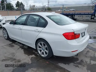2015 BMW 3 Series 320i with VIN WBA3B1G52FNT06107, listed as a IAAI auction lot 41777304 with 85,832 mi miles. Bid and sale history available at carsss.com. Image 3.