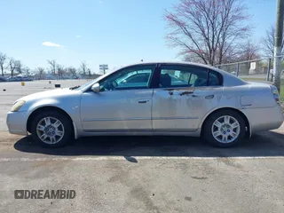 2006 Nissan Altima 2.5 S with VIN 1N4AL11DX6N420451, listed as a IAAI auction lot 41906414 with 162,086 mi miles. Bid and sale history available at carsss.com. Image 14.
