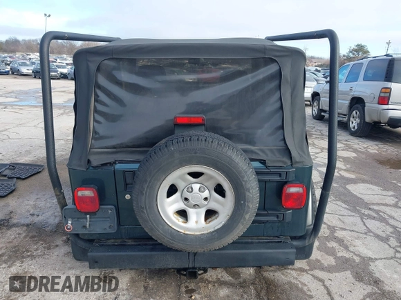 2005 Jeep Wrangler SE with VIN 1J4FA29S45P333916, listed as a IAAI auction lot 41214841 with 90,577 mi miles. Bid and sale history available at carsss.com. Image 16.