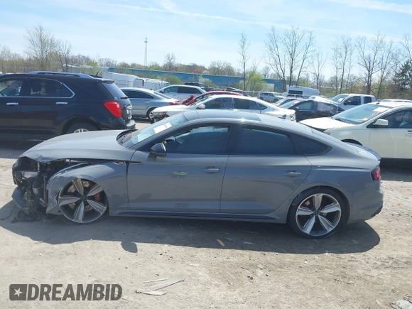 2019 Audi RS 5 Sportback z VIN WUABWCF53KA907286, wystawiony jako IAAI lot #42098943 z przebiegiem 62 275 mil mil oraz . Historia ofert i sprzedaży dostępna na DreamBid. Obrazek 13.