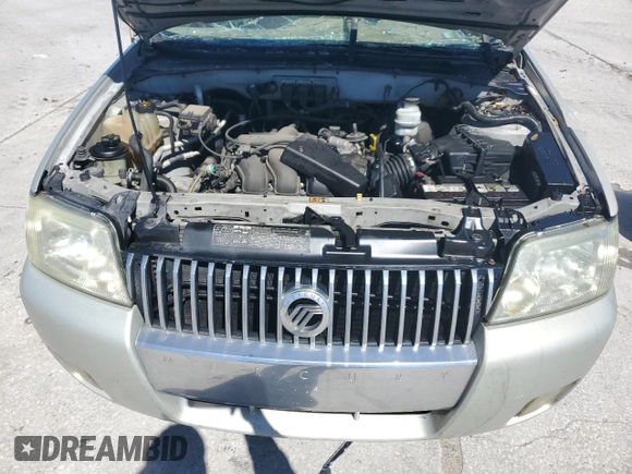 2005 Mercury Mariner Luxury z VIN 4M2CU56125DJ17538, wystawiony jako Copart lot #46948345 z przebiegiem 158 277 mil mil oraz Szkoda całkowita • Salvage title. Historia ofert i sprzedaży dostępna na DreamBid. Obrazek 12.