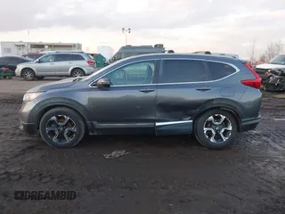 2017 Honda CR-V Touring with VIN 2HKRW2H94HH617081, listed as a IAAI auction lot 41294254 with 145,140 mi miles. Bid and sale history available at carsss.com. Image 14.